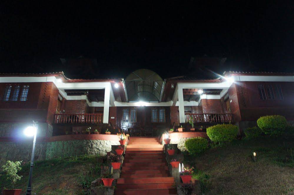 Misty Courtyard by UTH, Munnar